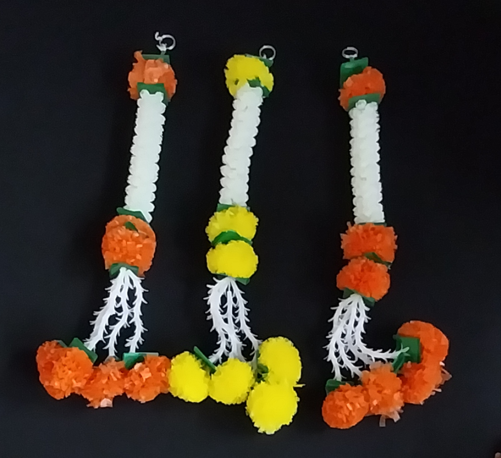 Marigold flower with white mogra hanging