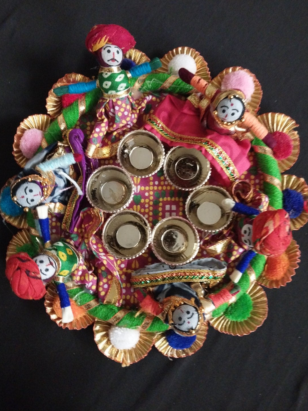 Puja platter with hand-crafted puppet