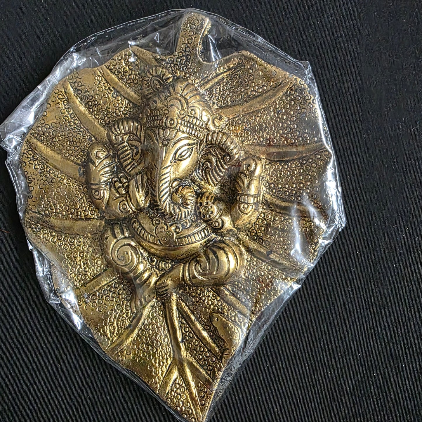 Metal Ganesh on leaf