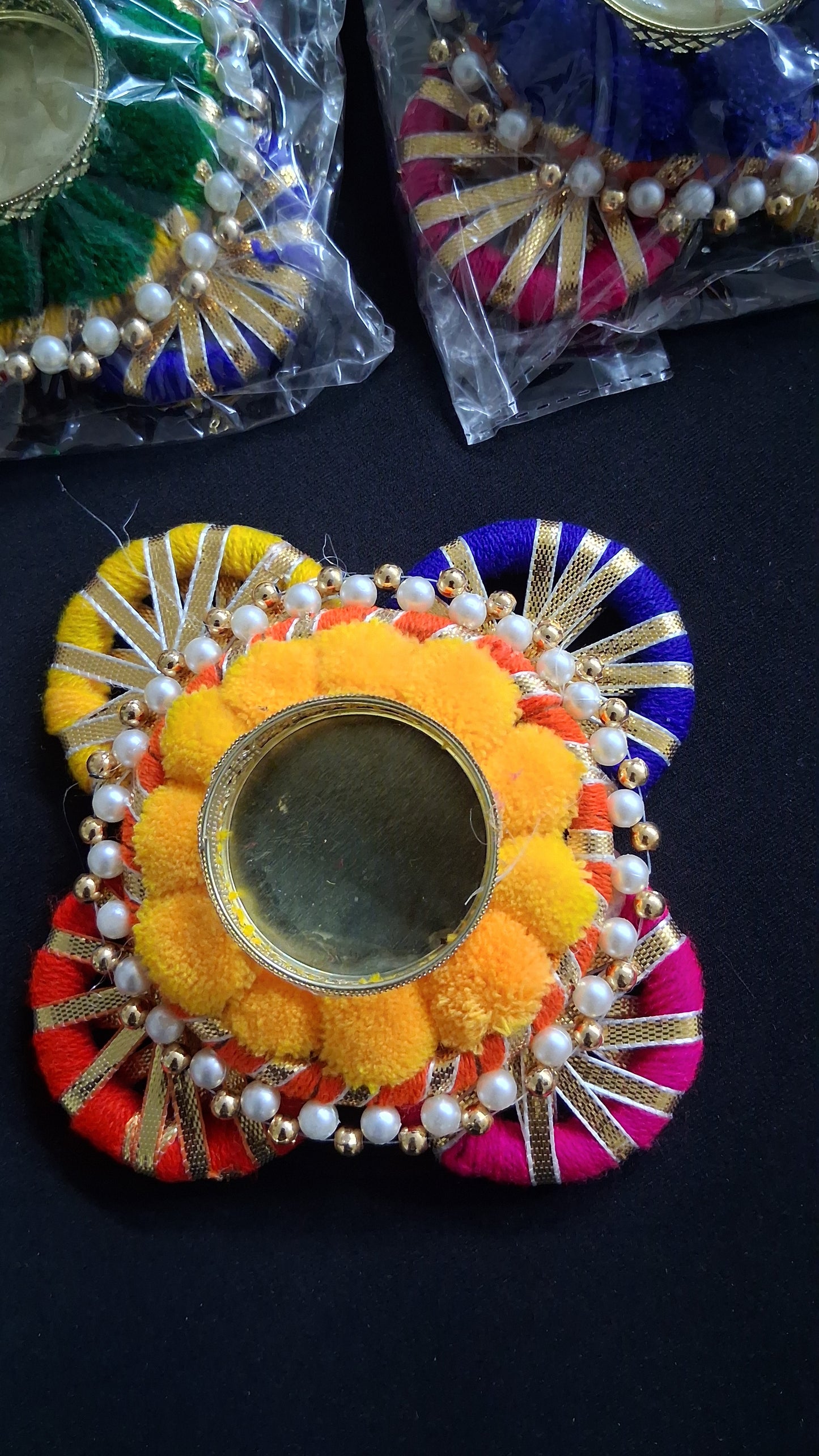Handcrafted pompom Chakra tealight holder